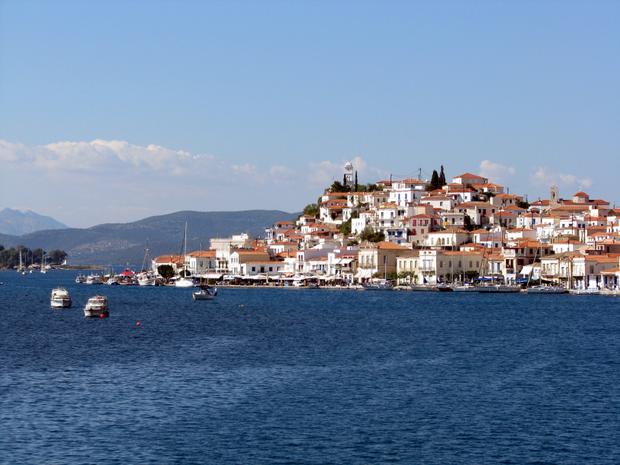 View from a small ship cruise of a town on the hillside in Greece.
