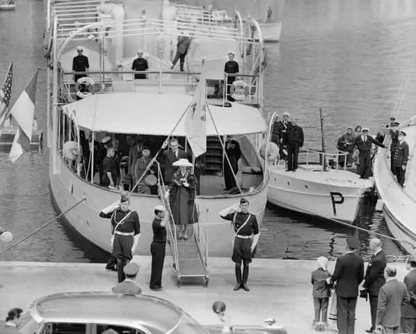 Royal couple disembarking motor yacht Grace in the 1950's.
