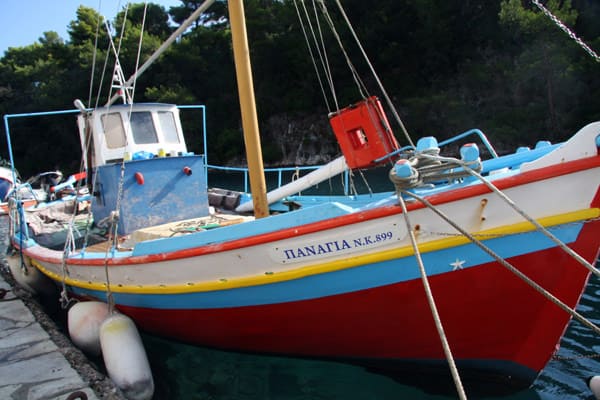 Colorful fishing boat in Paxos, Greece.
