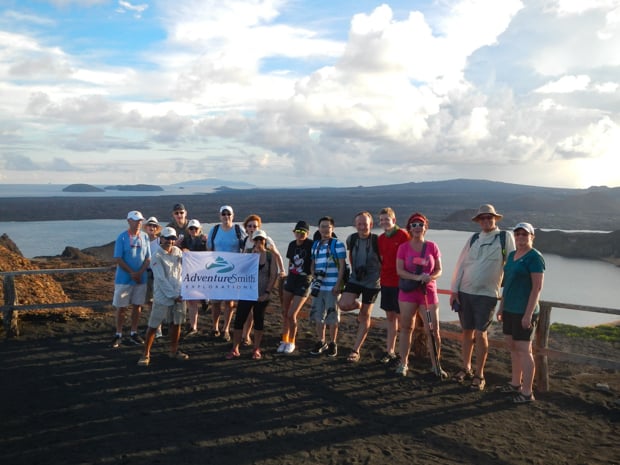 Group of Adventuresmith Explorations travelers on a view point in the Galapagos.