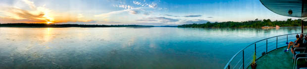 Sunset over the Ecuadorian Amazon river from the ship.
