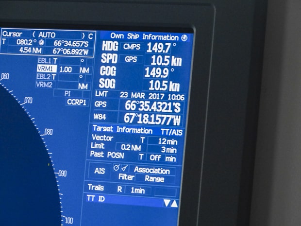 GPS on bridge showing the small ship expedition south of the Antarctic circle.