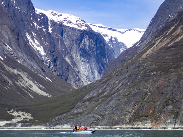Guests from small ship cruise on a skiff excursion in Endicott Arm, ALaska.