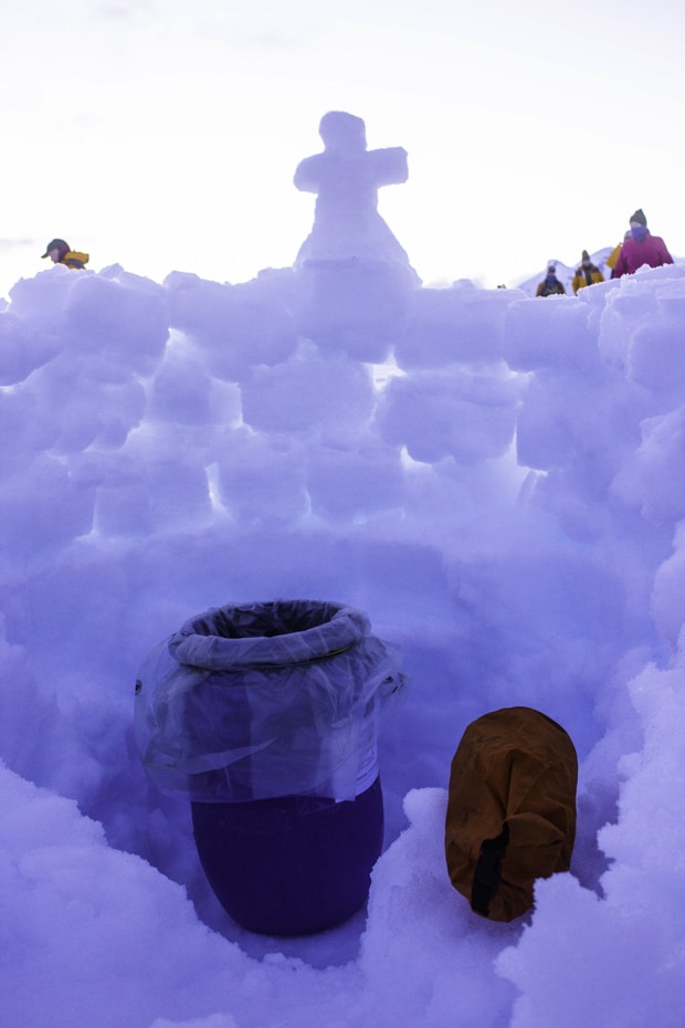 Plastic lined container as a toilet with a wall of snow around it for privacy, used on a camping excursion in Antarctica.