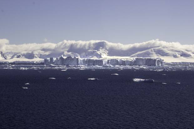 Icebergs seen from a small ship cruise approaching Antarctica.