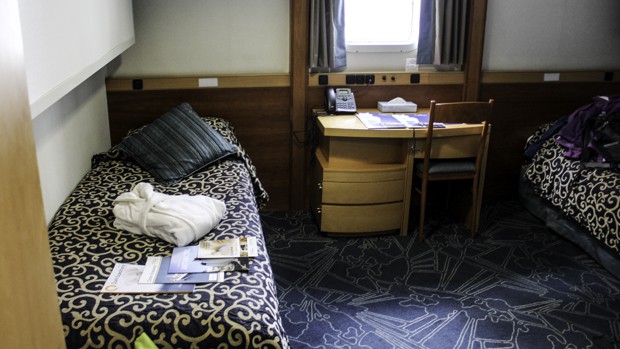 Upper deck twin cabin with window on the Ocean Edeavour small ship cruise in Antarctica.