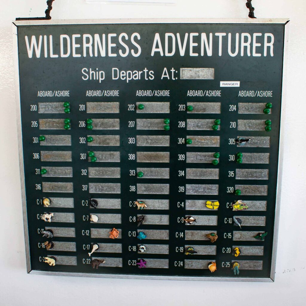 A magnetic board with cabin number magnets on the Wilderness Adventurer used to with our room number to alert the staff if guests were aboard or on shore.
