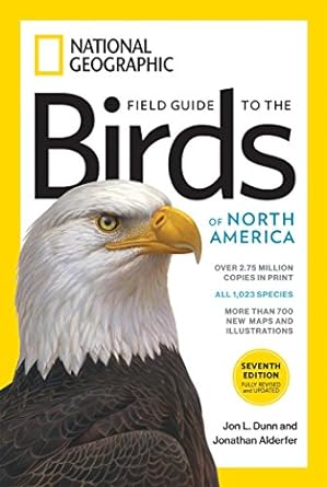 Book cover of the National Geographic Field Guide to the Birds of North America with a yellow border a large bald eagle head and the book title, authors and awards listed.