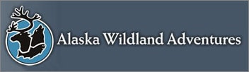 Alaska Wildland Adventures blue logo with wolf, fish and caribou.