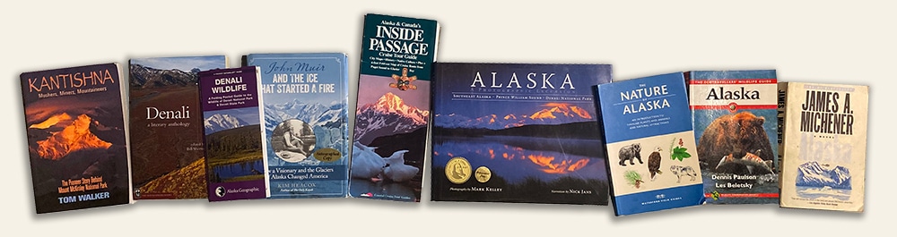 A collage of book covers of the top Alaska books and recommended reading when preparing for an Alaska small ship cruise.