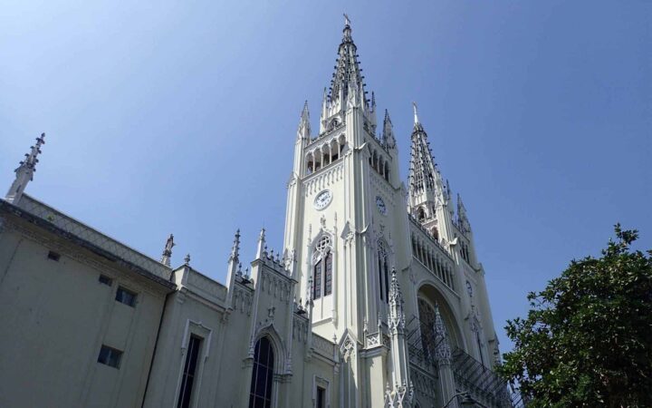 View of Bolivar Cathedral from the ground looking up at the spires while on a Guayaquil city tour.