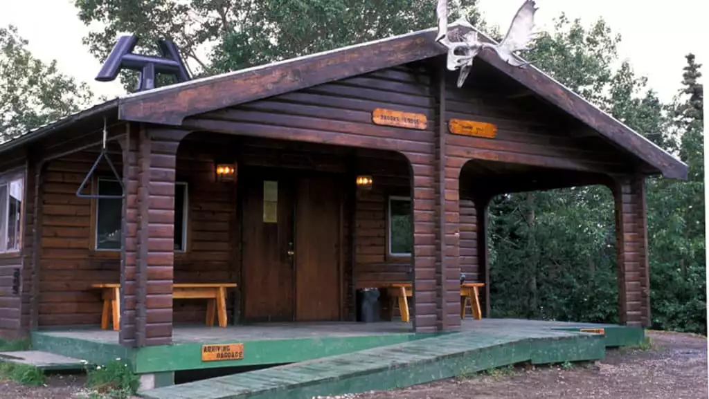 The Brooks Lodge, a charming and old log building, is one of the best access points for watching brown bears fish for sockeye salmon in Katmai National Park.