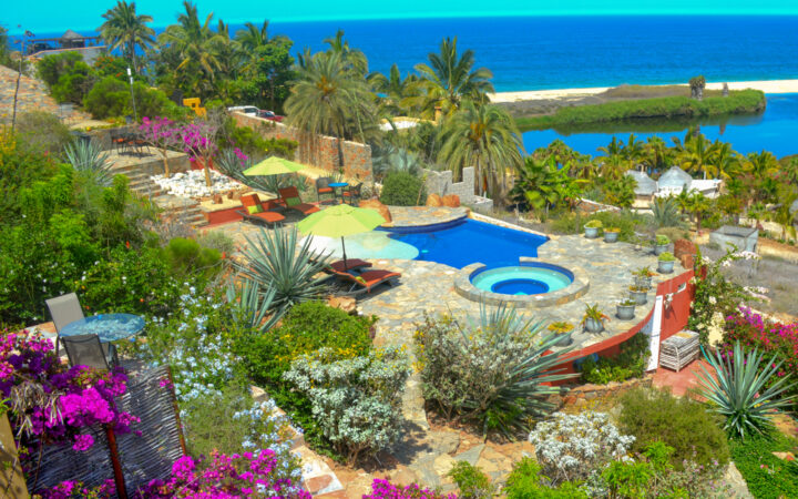 The boutique Baja hotel Los Colibris Casitas is has a deep connection to the local environment with desert vibes, pools, vegetation and views of the ocean