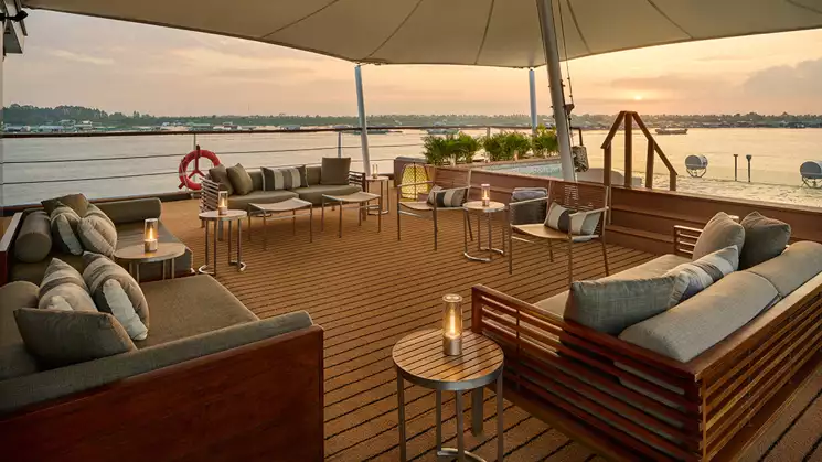 The outdoor lounge and plunge pool offers unparalleled views of the Mekong river and countryside as you cruise aboard Aqua Mekong