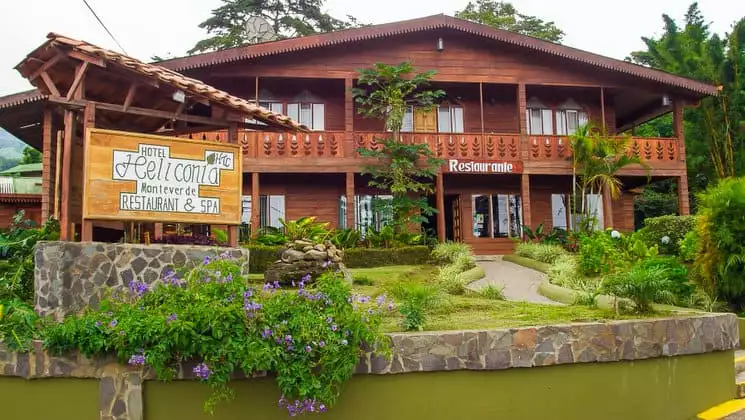 The exterior of Hotel Heliconia, in Costa Rica's Monteverde region, is surrounded by lush jungle and fresh flowers