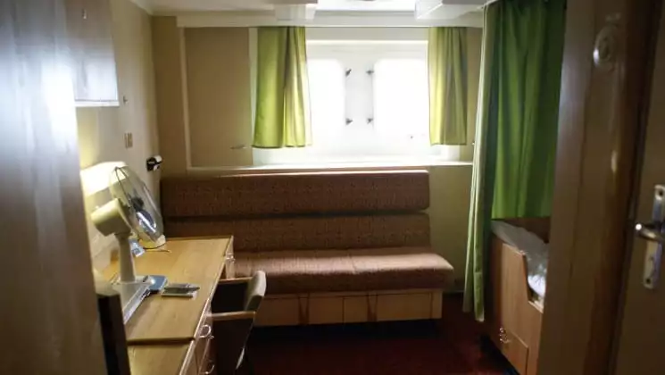Standard Twin cabin's living space. Photo by: Quark Expeditions