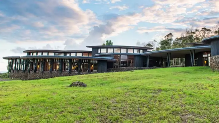 Grassy lawn and exterior of Explora Rapa Nui Lodge on Easter Island