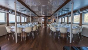 Set tables in dining room aboard Avangard.