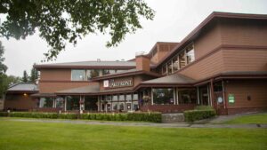 The lawn and exterior of the Lakefront Anchorage, a stopover for those exploring the Alaskan wilderness