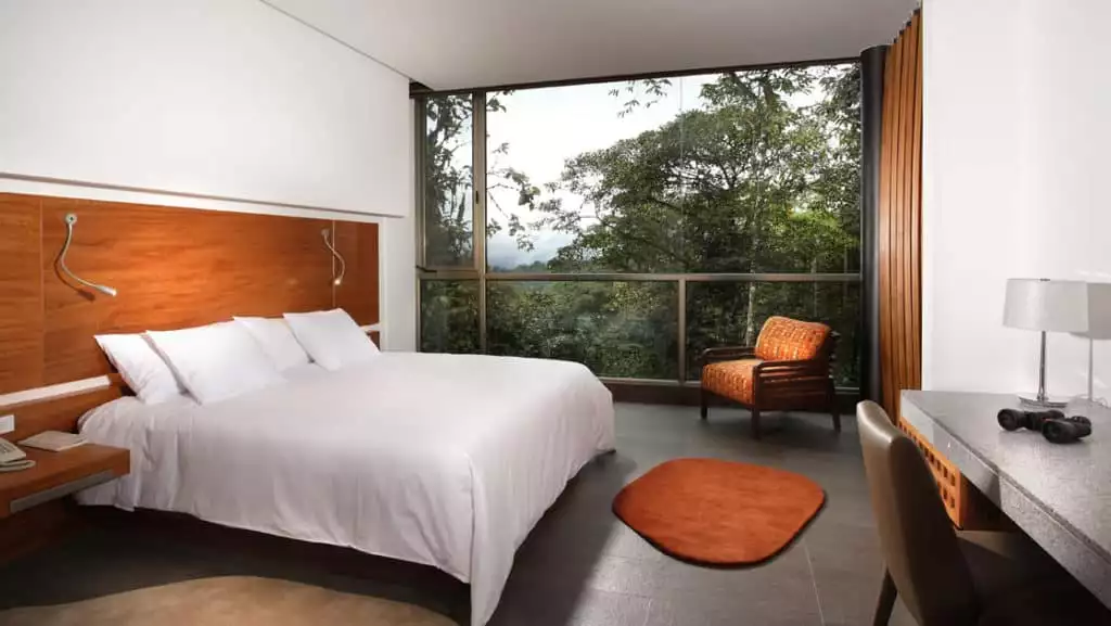 Wayra Room with a king bed at Mashpi Lodge. Photo by: Juan Pablo Merchan.

