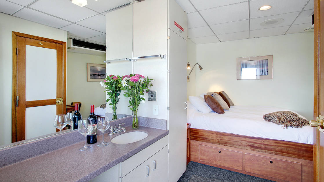 Navigator cabin with queen bed aboard Wilderness Explorer
