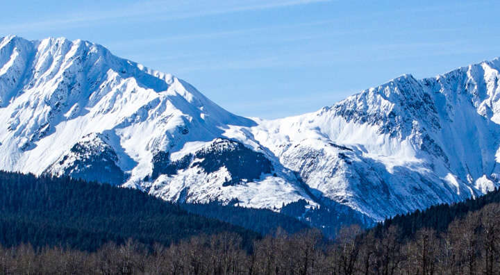 Alaska's Chilkat Mountain range taken by an Alaska travel guide while rafting down the river.