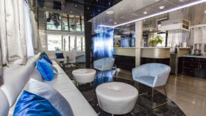 Indoor lounge and bar aboard Ave Maria.