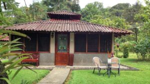A table for two on the grass outside a deluxe bungalow at Casa Corcovado Jungle Lodge in Costa Rica