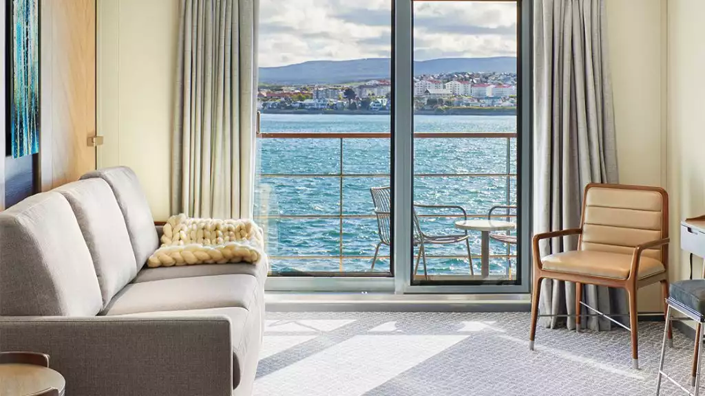 Grande Suite living room aboard Magellan Explorer. Photo by: Tom Arban 