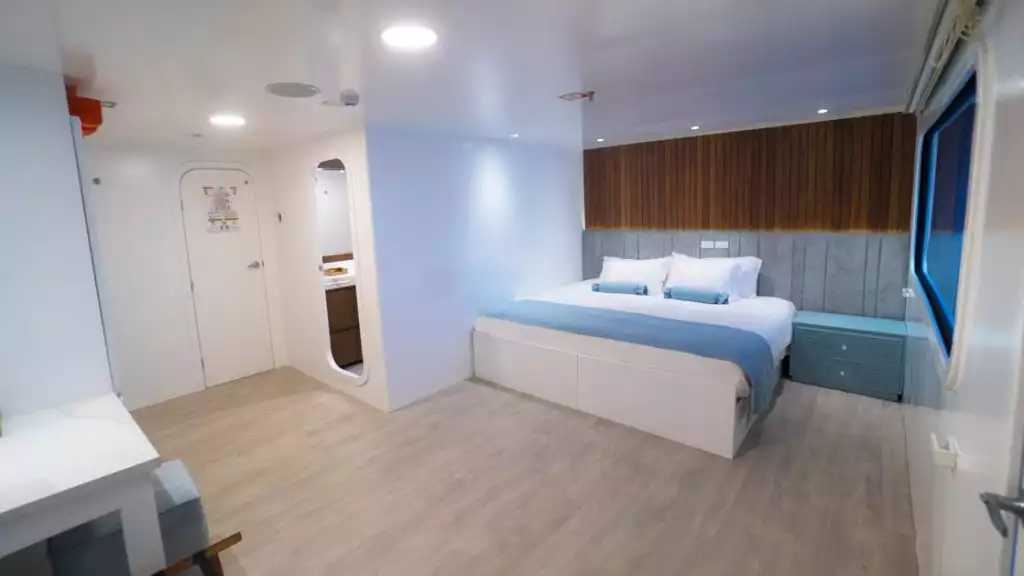 Stateroom with king-size bed aboard Ocean Spray