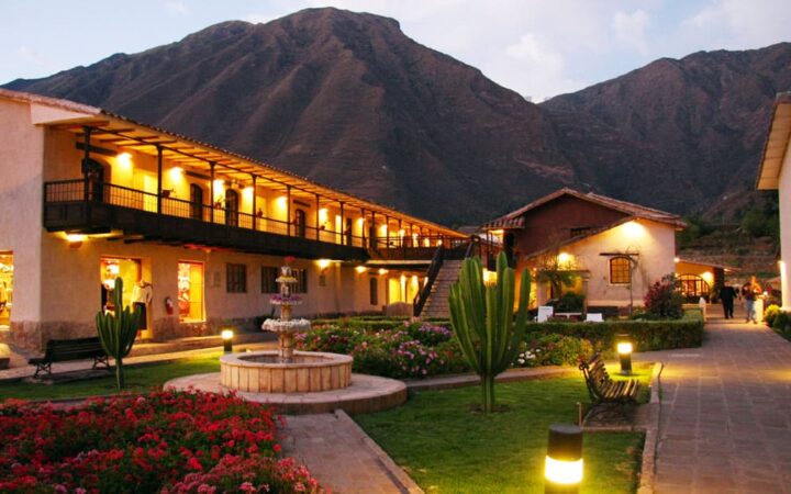 Lights illuminate the courtyard, gardens, and fountains at Sonesta Posadas Del Inca Sacred Valley Yucay, located ini Peru and only a train ride from Machu Picchu