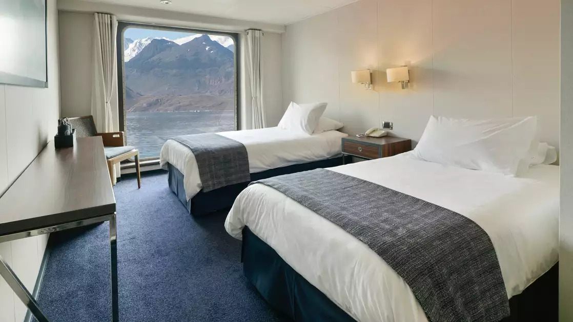 The Stella Australis in Chilean Patagonia has plenty of space in the AAA Twin cabin features twin beds with a full length window