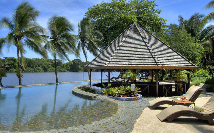 The pool at Tortuga Lodge, one of Costa Rica’s most environmentally conscious resorts, is designed to blend into the river and features an eco-friendly purification system.