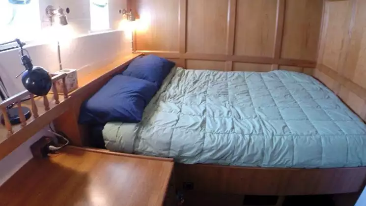 Cabin 4 with a desk with drawers and storage under the bunk aboard the westward.
