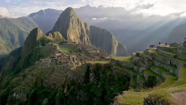 approaching machu picchu on salkantay trek land tour