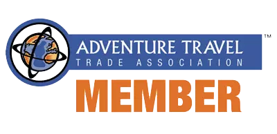 Adventure Travel Trade Association Member logo with globe on axis graphic