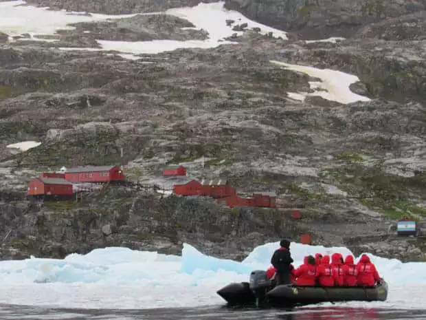 Group aboard a skiff from their small ship heading to a research station in Antarctica. 