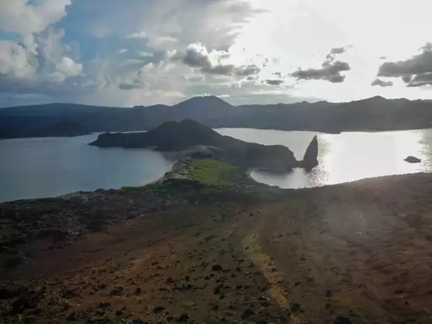 Hour glass shaped peninsula in Sullivan Bay and Pinnacle Rock jutting out.