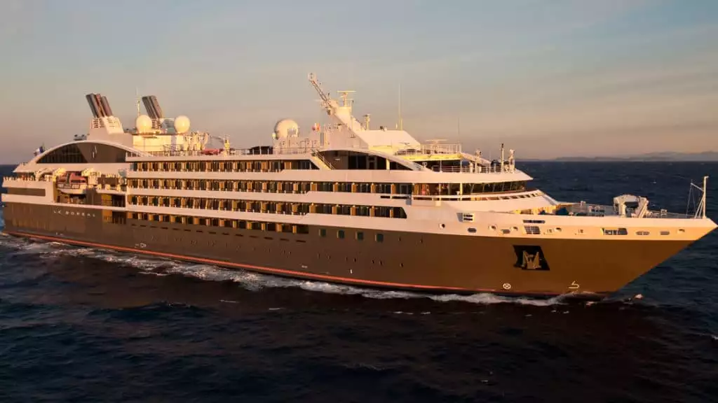 Exterior of expedition ship Le Boreal with 6 passenger decks & gray hull
