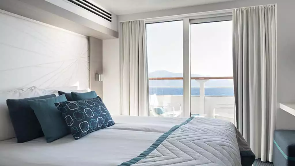 Prestige Stateroom - Deck 4, 5 & 6 with king bed aboard Le Lyrial. Photo by: Nicolaus Matheus/Ponant