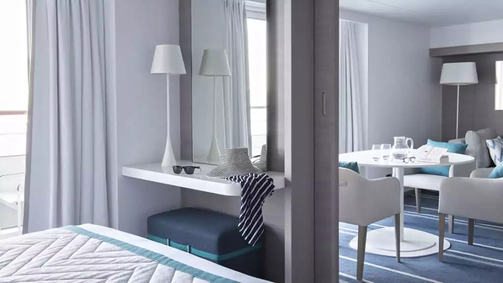 Privilege Suite - Deck 6 with king bed aboard Le Lyrial. Photo by: Nicolaus Matheus/Ponant