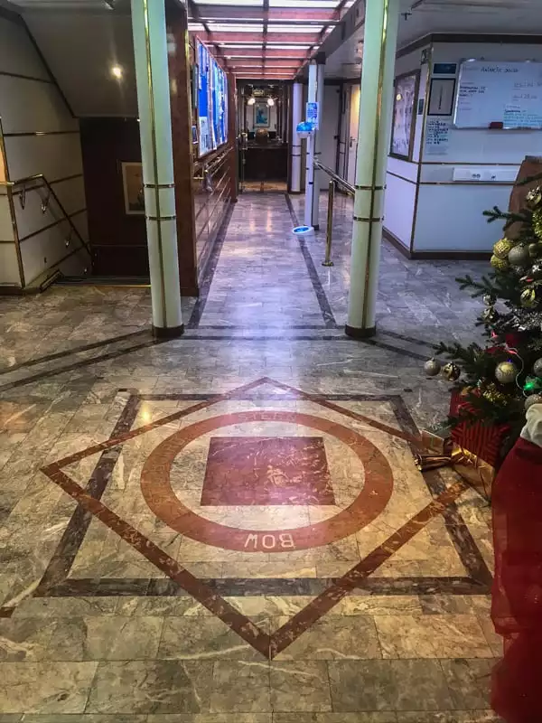 A compass rose created in the granite floor of deck three aboard hebridean sky polar expedition ship  