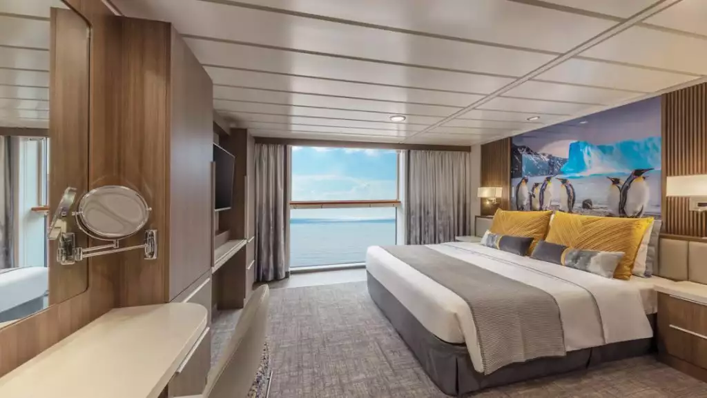 Superior Stateroom with king bed aboard Sylvia Earle. Photo by: Benjamin Tan & Masano Kawana