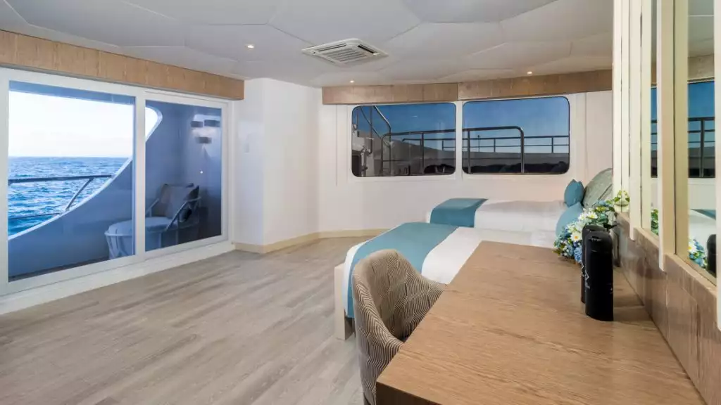 Golden Suite with two twin beds aboard Elite