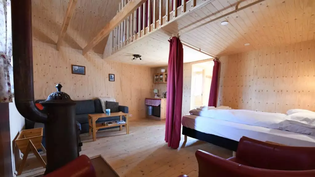 Downstairs double bed in traditional turf guesthouse