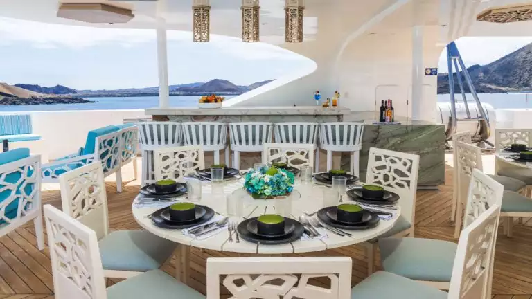 Enjoy dining alfresco at the sky deck dining bar while enjoying the beauty of the Galapagos while aboard the Elite
