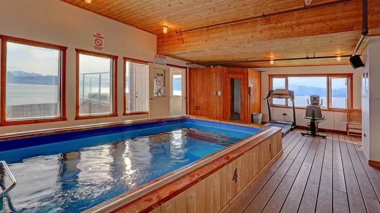 inside pool and suana with wood floors and ceilings