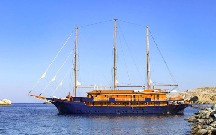 mediterranean small ship cruising in greece on a calm sunny day