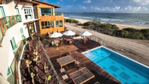 The view from the Iguana Crossing Boutique Hotel overlooks the pool, beach, and ocean on Isabela Island in the Galapagos Islands.