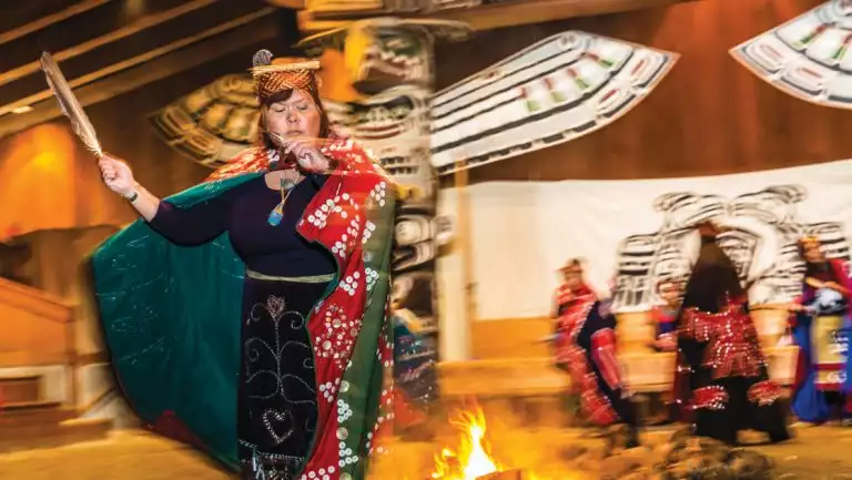 The Kwakwaka'wakw people in full dance regalia in Alert Bay, Cormorant Island, British Columbia, Canada.